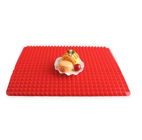 Cook healthier meals with this non-stick silicone pyramid mat. Perfect for roasting, grilling, and baking. Heat-resistant, reusable, and easy to clean.